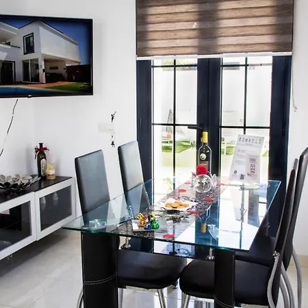 Elegant Playa Blanca: Poolside Retreat