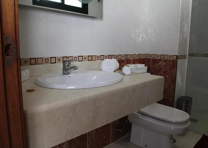 Elegant Playa Blanca: Poolside Retreat